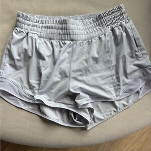 Lululemon womens hottie hot size 10 2.5 inch shorts. Very light lavender color.